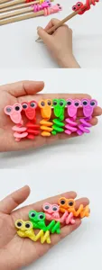 Cute spiral silicone pencil grips with moving googly eyes, fun student stationery toys.