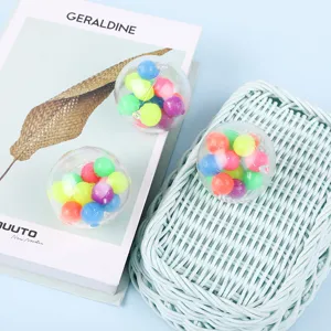 Detailed close-up view of clear transparent stress relief balls filled with colorful small beads.