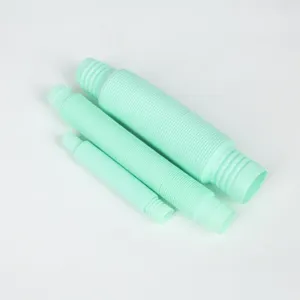 Details of the pastel green telescopic pop tubes, showing flexible corrugated plastic design.