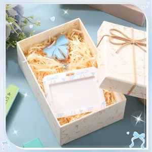 Cute blue bow ID card holder with retractable badge reel, perfect for office and school use.