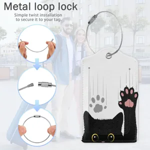 Detail view showing black cat leather luggage tag installation with metal loop lock mechanism.
