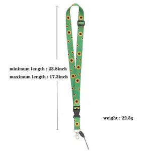 Green sunflower print lanyard with adjustable buckle, metal clasp, and phone loop detail.