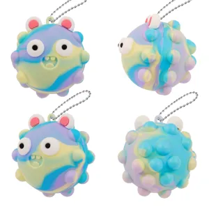 Vue détaillée du jouet sensoriel coloré en silicone avec oreilles d'ours et porte-clés.