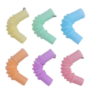 Colorful mini pop tube keychain set detail view, featuring six macaron colors flexible toys.