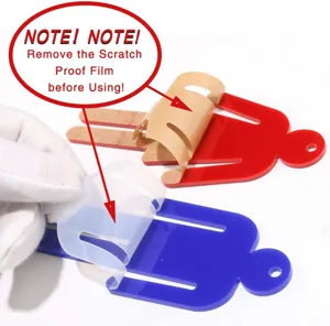 Detail view of acrylic restroom keychain tag showing protective film removal process.