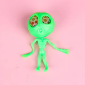 Green alien squeeze toy with colorful beads inside, fun sensory stress relief toy for kids.
