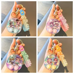 Cartoon water game machine keychain cute liquid toy bag pendant with cute dolls for gifts