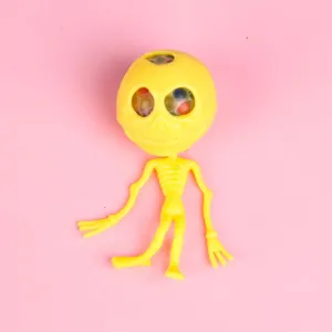 Yellow skull alien squeeze toy fidget stress relief toy for Halloween party fun play