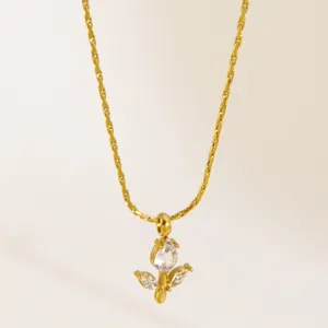 Dainty stainless steel 18K gold plated flower pendant necklace with sparkling clear cubic zirconia.