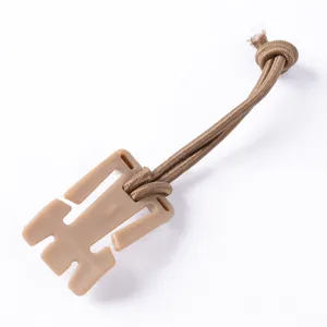Outdoor tactical webbing buckle with elastic cord, durable plastic storage clip for backpacks.
