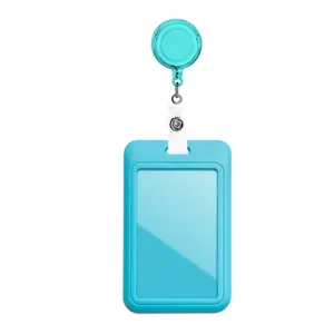 Detailed view of the blue retractable badge reel and ID card holder, perfect for office use.