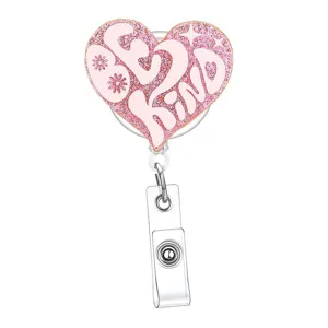 Rosa Glitzer Herz Ausweishalter mit niedlichem 'BE KIND' Druck und stabilem Clip Detail.