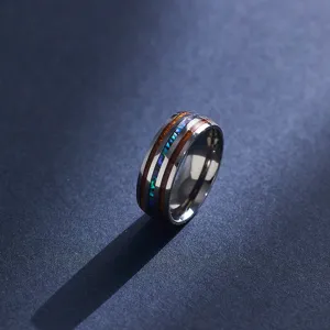 Detailed close-up view of the titanium steel ring featuring exquisite wood and shell inlay.