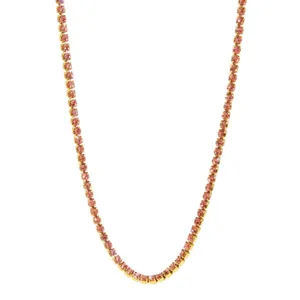 Gold-plated pink crystal tennis necklace detail, elegant shimmering rhinestone clavicle chain