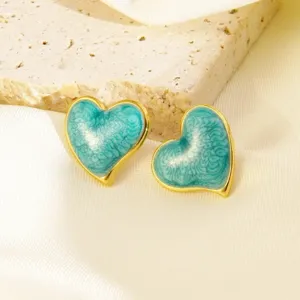 Chique turquoise hart oorhaken met gouden rand. Duurzaam roestvrij staal voor dagelijks.