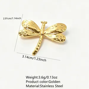 Golden stainless steel dragonfly brooch, elegant animal design jewelry with size details.