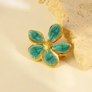 Élégante broche fleur émail vert en acier inoxydable avec contour doré pour femmes style chic