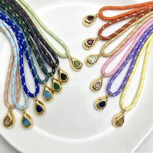 Colorful woven rope necklace with teardrop gemstone pendant fashion jewelry detail view