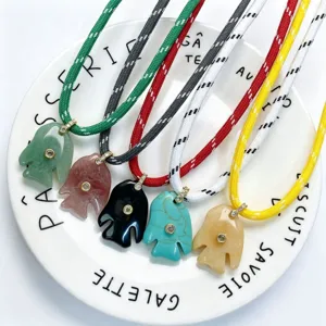 Natural stone carved fish pendant necklace with crystal zircon inlay and colorful braided rope