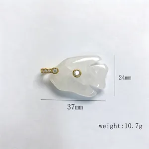 Close-up detail view of the crystal fish pendant with zircon setting and dimensions.