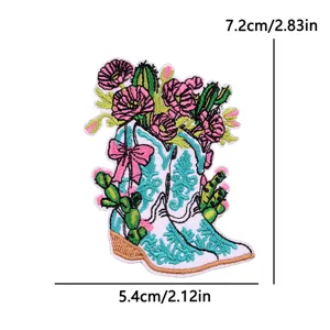 Embroidered cowboy boot patch with pink flowers cactus and bow appliques for clothing repair.