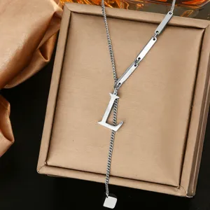 Detailed shot of a stylish silver titanium steel letter L pendant necklace with unique bar links.