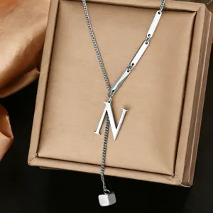Stainless steel letter N pendant necklace, elegant Y-shaped chain design for daily fashion wear.