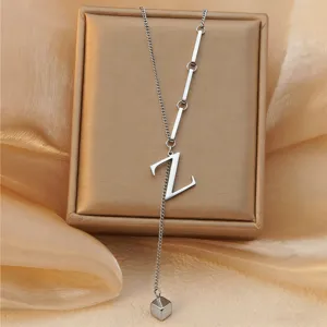 Detailed view of stainless steel letter Z lariat necklace, elegant titanium steel jewelry piece.