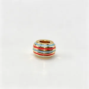 Close-up detail of a colorful striped enamel large-hole DIY charm bead for jewelry making.