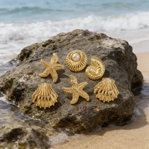 Ocean series starfish seashell metal earrings detail shot, resort style fashion jewelry.