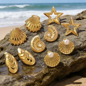Ocean style stainless steel earrings featuring starfish, shell and snail designs for beach vacation.