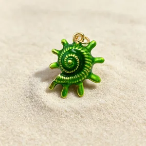 Close up of a green enamel conch shell copper pendant, ideal for DIY ocean style jewelry accs.