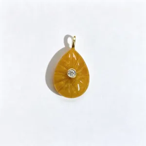 Natural stone crystal teardrop pendant detail shot, exquisite gold bail and center zircon.