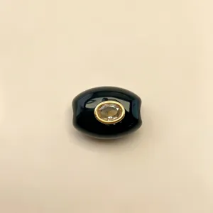 Schwarzer ovaler Anhänger mit goldenem Rand und klarem Kristall für DIY Ketten Schmuck Basteln.