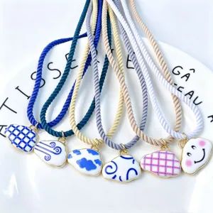 Details of colorful rope enamel cloud pendant necklaces, cute DIY jewelry accessories.