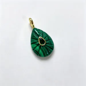 Exquisite teardrop malachite pendant with gold trim and central green gemstone.