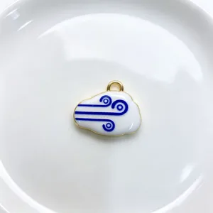 Enamel cloud pendant charm with blue wind pattern and gold edge for DIY necklace making.