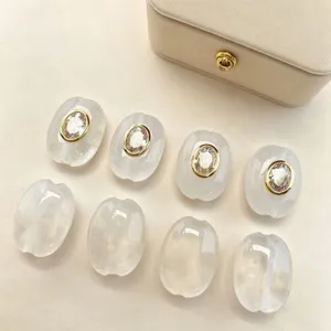 Natural stone oval spacer beads detail, crystal zircon inlay for DIY handmade jewelry crafting.