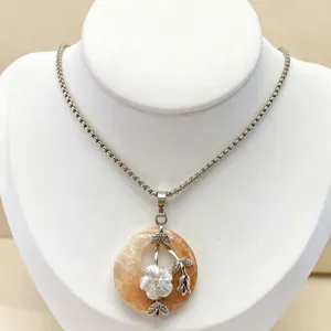 Natural abalone shell pendant detail, ethnic style floral design, elegant clavicle necklace.
