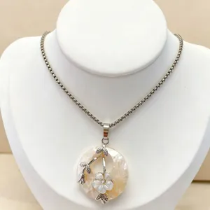 Stunning natural shell flower pendant necklace with silver chain, elegant ethnic style jewelry.