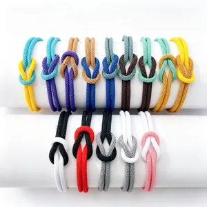 Two-color adjustable braided rope bracelet with figure-eight knot, perfect couple gift.