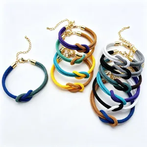 Adjustable double color braided rope bracelet with figure eight knot and metal chain details