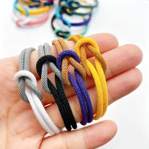 Handcrafted dual-color woven 8-shape knot rope bracelets, perfect couple jewelry gift.