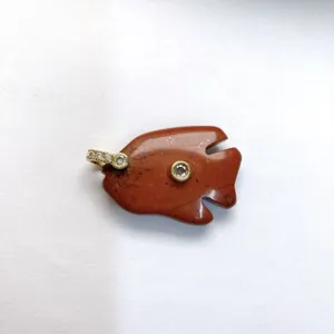 Exquisite natural stone tropical fish carved pendant featuring sparkling inlaid zircon gemstone details.
