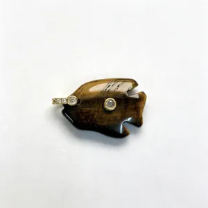 Natural stone carved tropical fish pendant close-up, gold-tone bezel rhinestone jewelry detail.