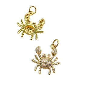 Gold crab pendant charms with micro-inlaid cubic zirconia, perfect for DIY jewelry making.