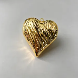 Gold plated 3D heart pendant with diamond cut texture, perfect for DIY jewelry necklace and earrings.