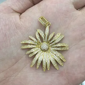 Gold-plated floral pendant featuring micro-paved sparkling stones, elegant and chic jewelry.