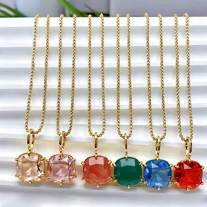 Detail view of 18k gold plated square colored cubic zirconia pendant necklace jewelry.