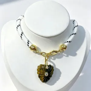 Natural tiger eye stone carved heart pendant necklace with sparkly zircon and white rope.